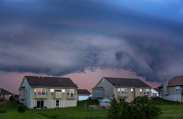 House listing photo with gray storm sky before replacement